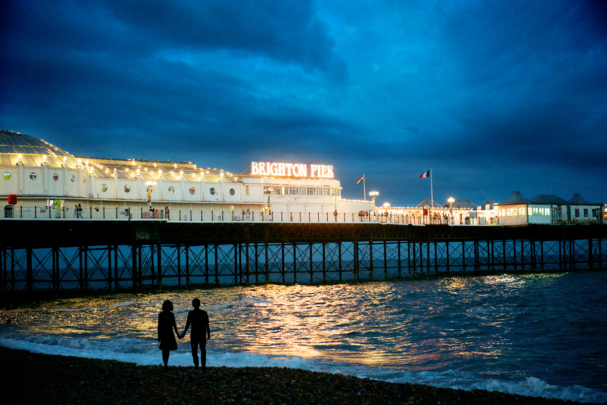 Brighton pier at night couple